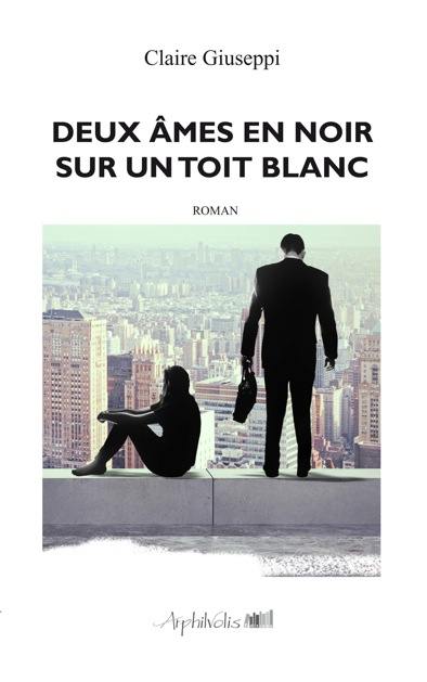 Deux âmes en noir sur un toit blanc