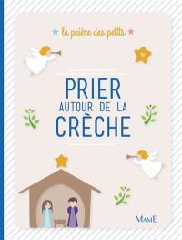 Prier autour de la crèche